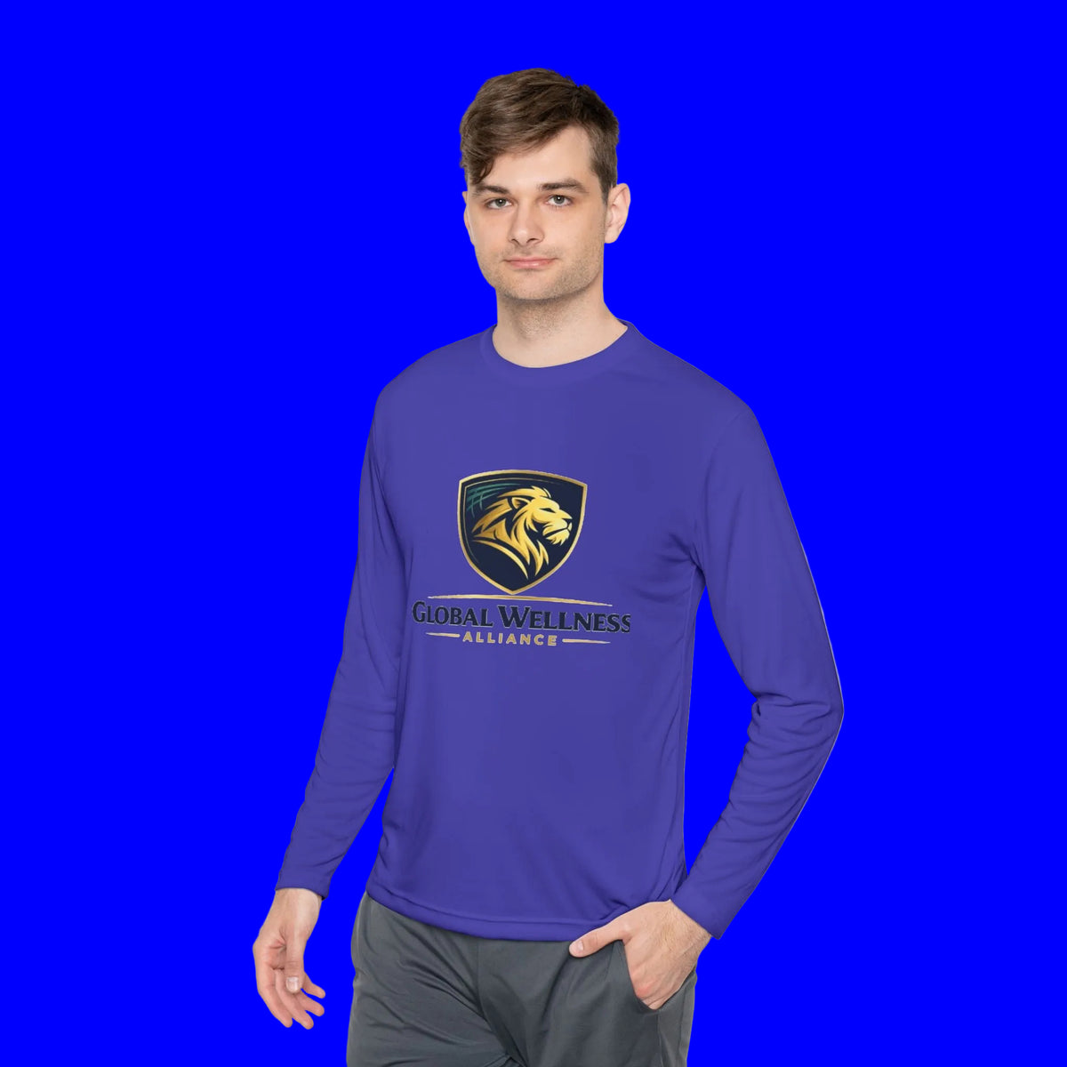 Model wearing moisture-wicking long sleeve tee in purple with Global Wellness Alliance logo.