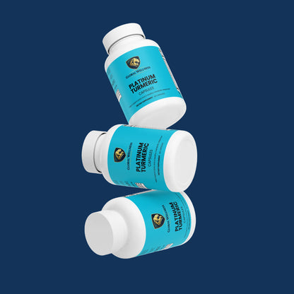 premium turmeric extract blend bottles stacked against a dark blue background